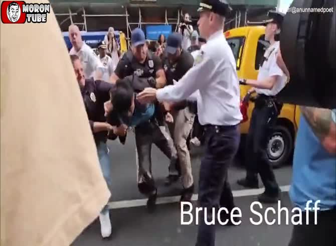 Video: NYPD crushes a teenage rioter's face against a taxi glass during the Kai Cenat riot